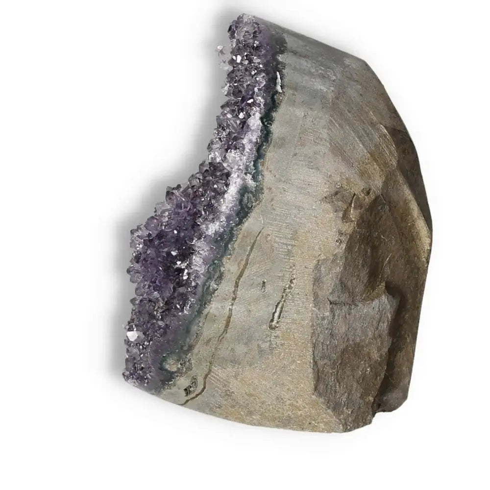 Premium Amethyst cut base geode from Sylvia Crystals, showcasing luxurious and spiritual elegance with vibrant purple hues.