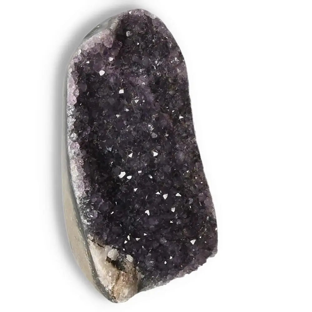 Amethyst cut base geode from Sylvia Crystals, showcasing deep purple hues and sparkling crystals for tranquility and balance.