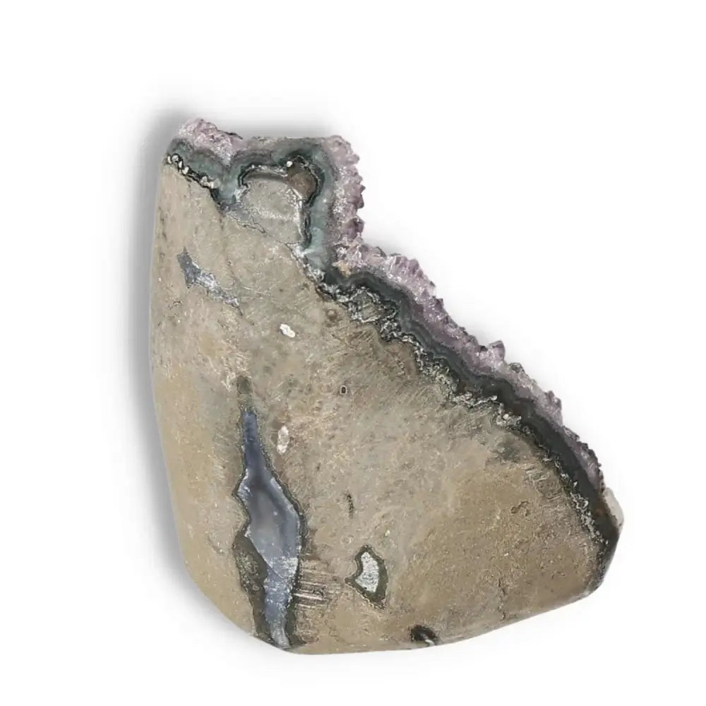 Amethyst cut base geode from Sylvia Crystals, showcasing its natural beauty and stress-reducing properties.