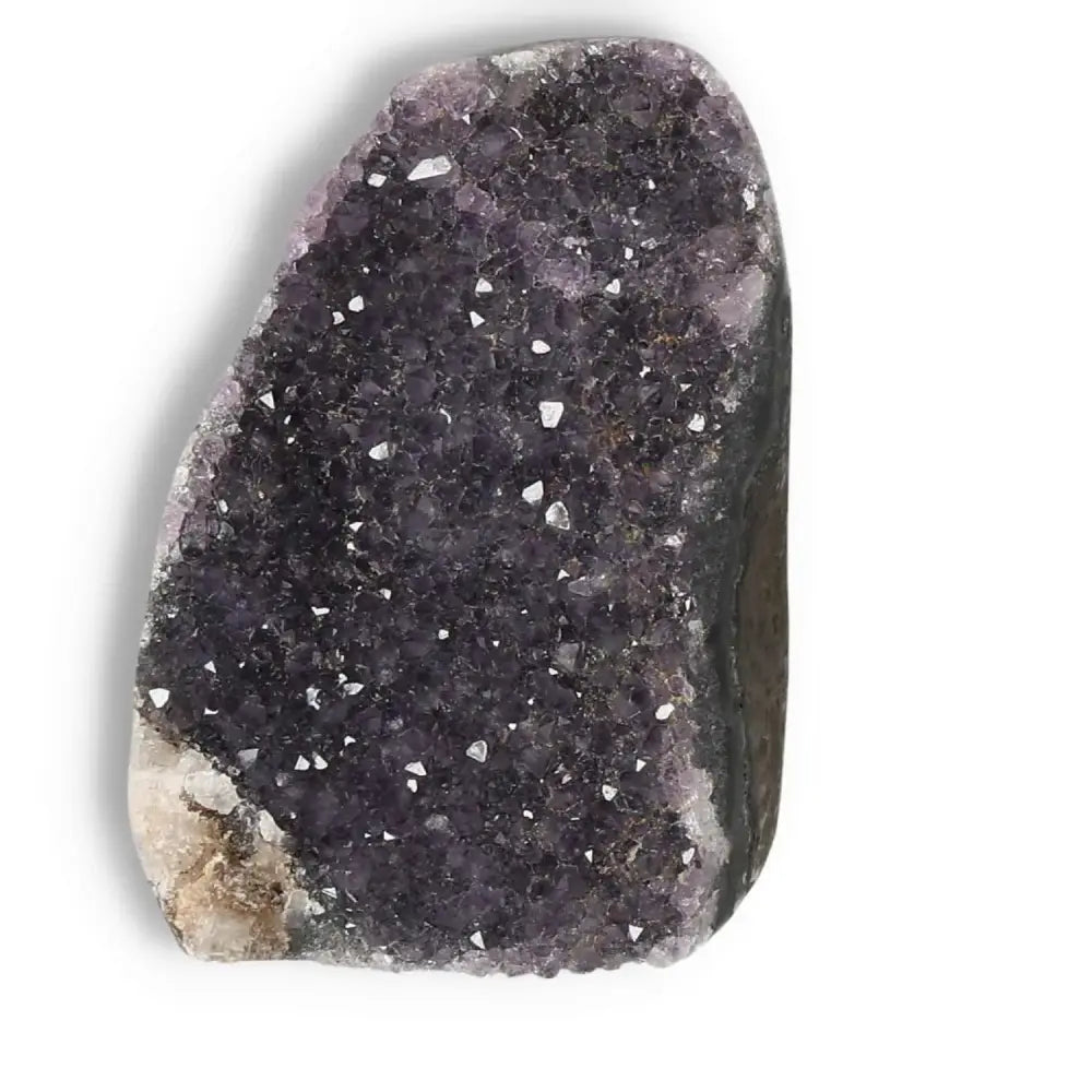 Amethyst cut base geode from Sylvia Crystals, enhancing tranquility and emotional stability, with stunning purple crystal formations.