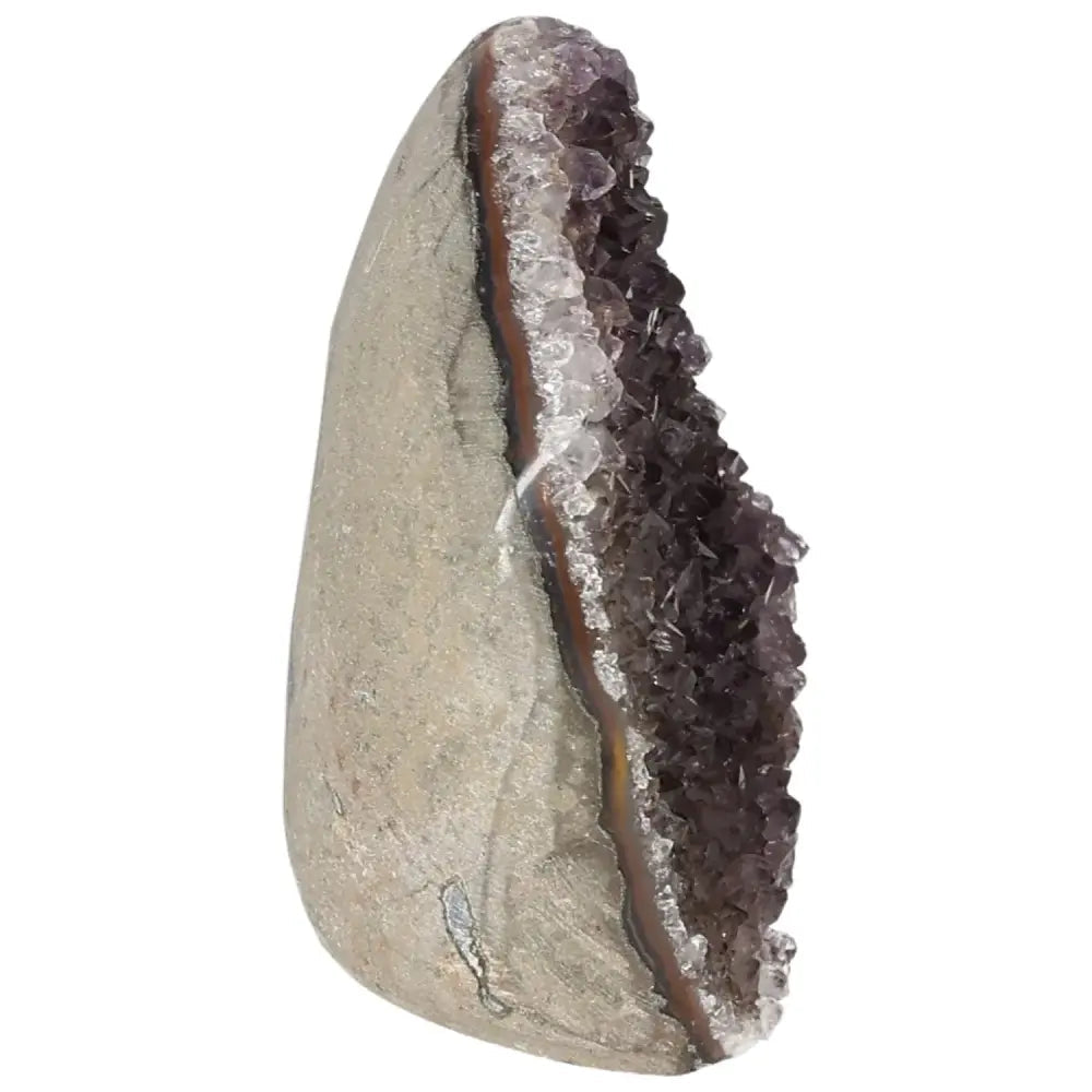 Amethyst cut base geode with deep purple hues, enhancing concentration and reducing stress, handpicked by Sylvia Crystals.