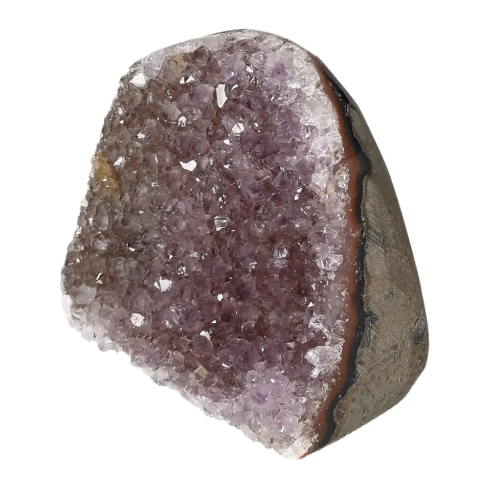 Amethyst cut base geode by Sylvia Crystals, featuring deep purple hues, known for stress reduction and enhancing concentration.