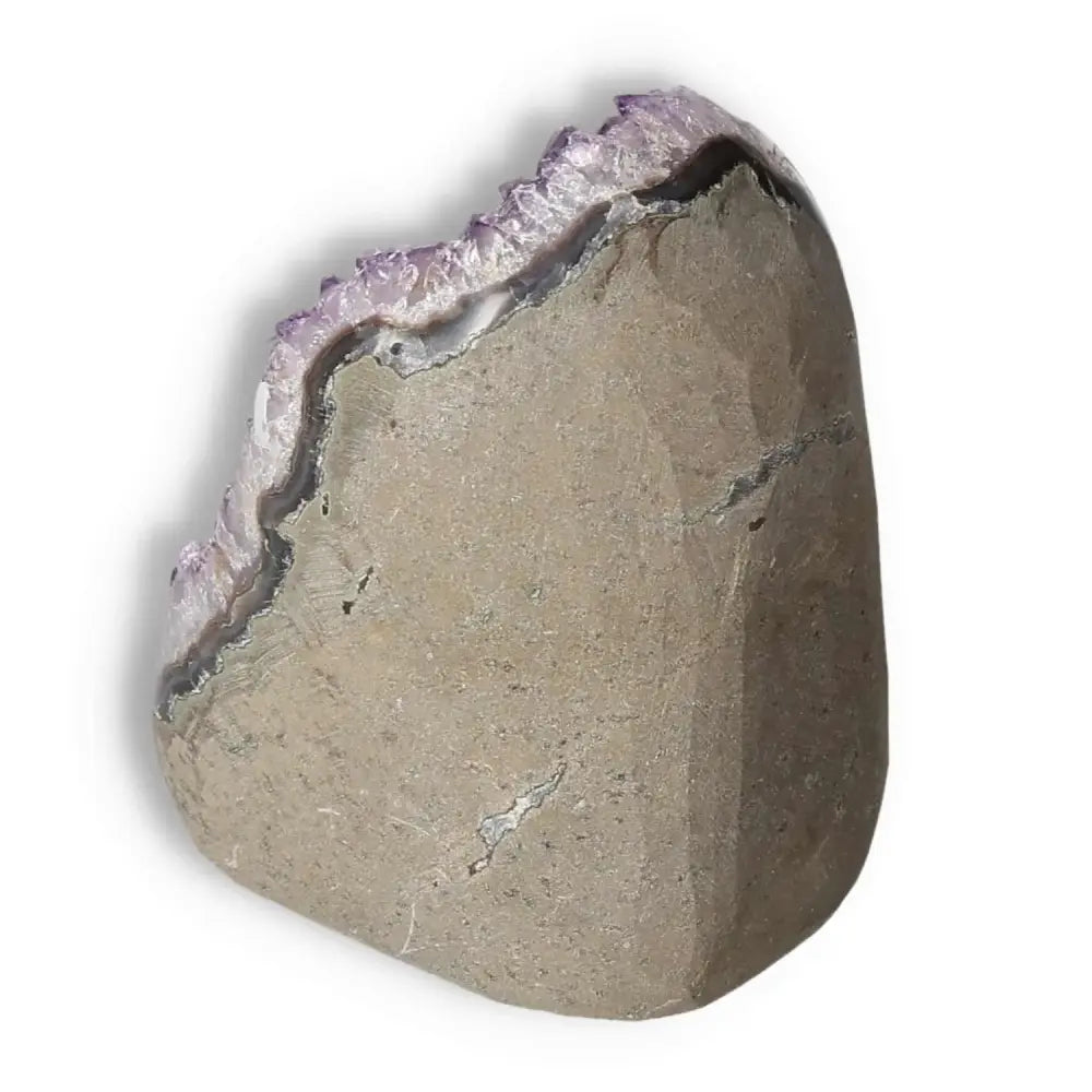Amethyst cut base geode showing crystalline interior, perfect for decoration or enhancing meditation and well-being.