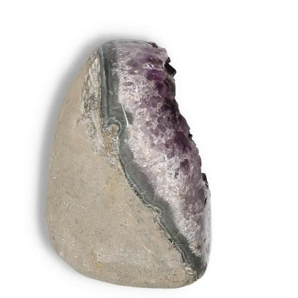 Amethyst cut base geode with deep purple crystals, offering tranquility and luxury, from Sylvia Crystals collection.