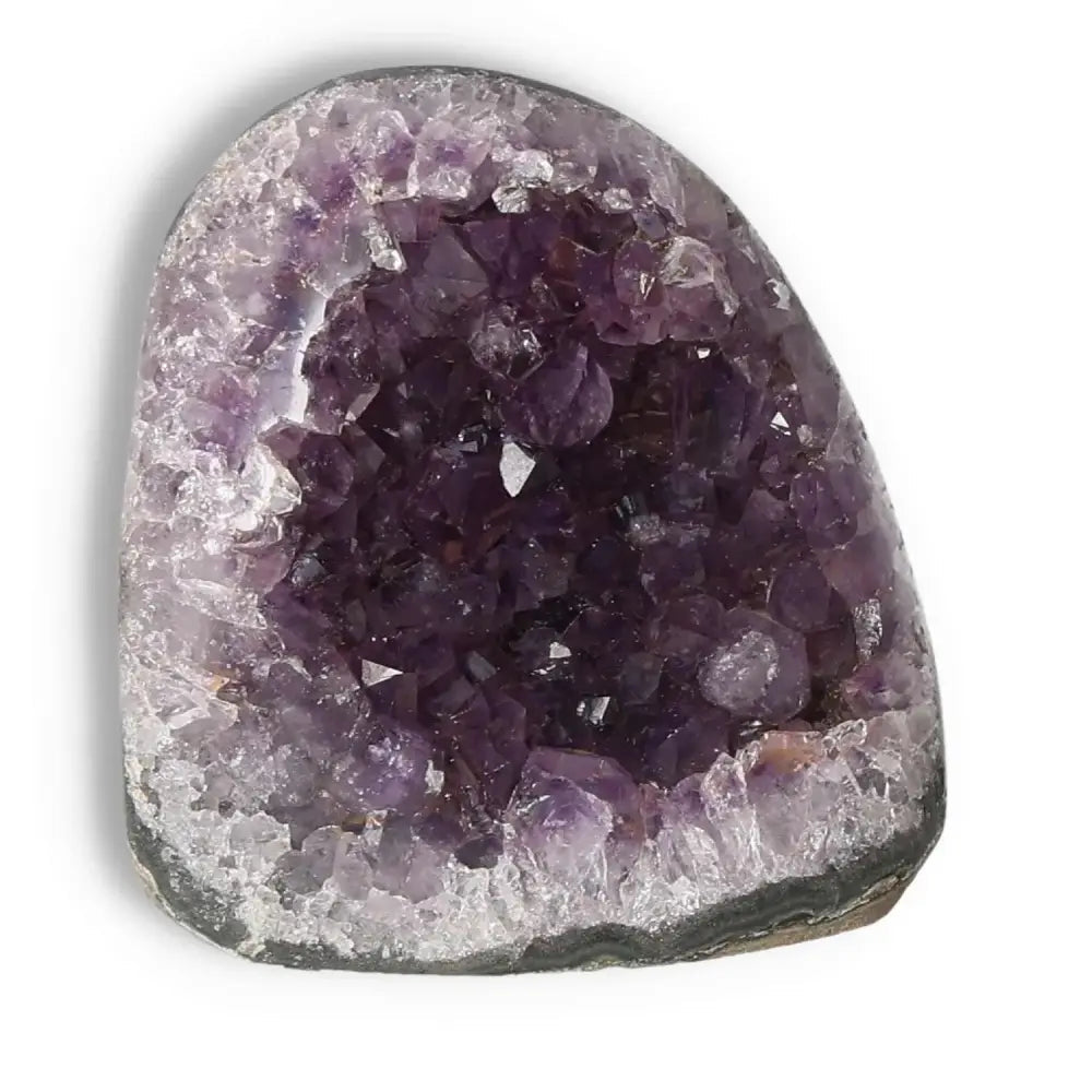 Amethyst cut base geode from Sylvia Crystals with deep purple hues, perfect for enhancing spaces with natural beauty and tranquility.