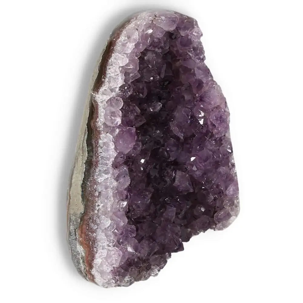Premium Amethyst cut base geode by Sylvia Crystals, luxury decorative piece with spiritual properties and elegant aesthetics.