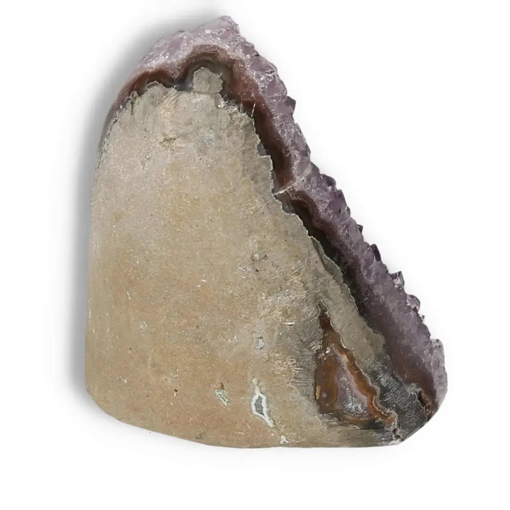 Amethyst cut base geode by Sylvia Crystals, showcasing luxury and elegance in a unique decorative and spiritual piece.