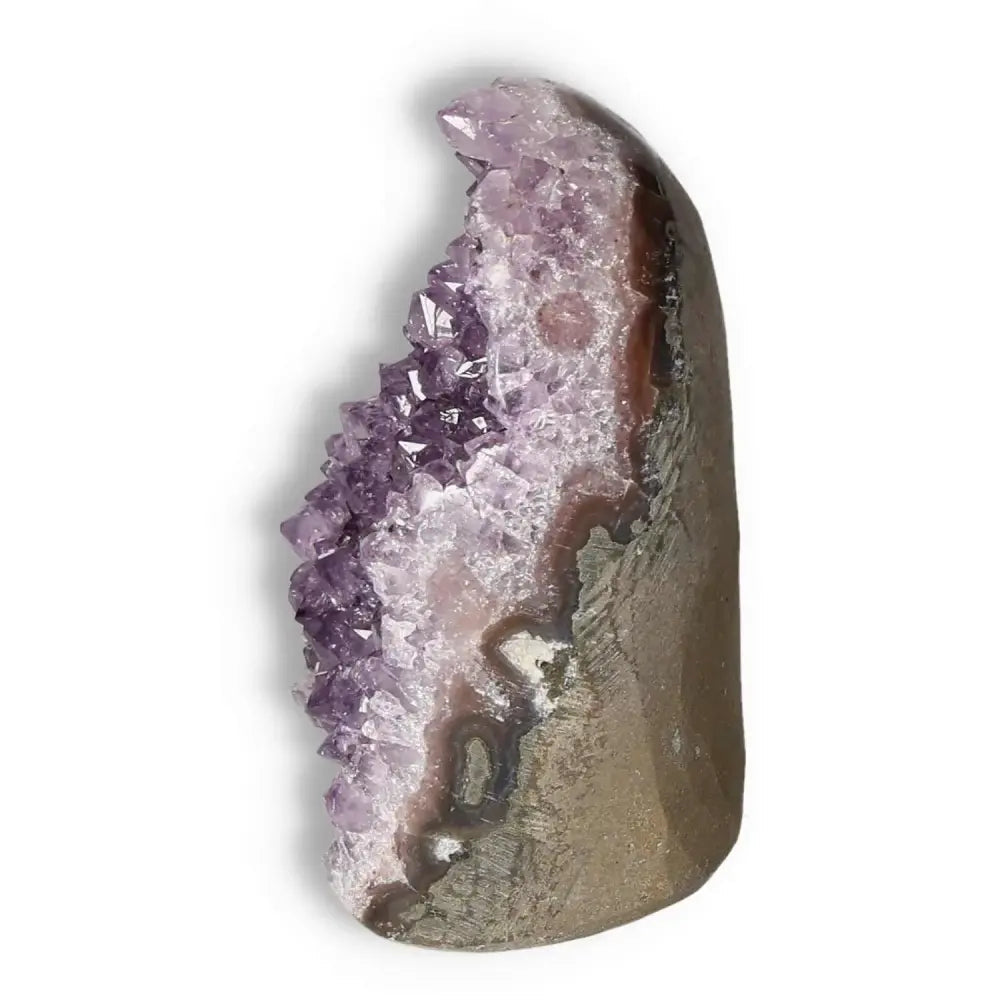 Amethyst cut base geode from Sylvia Crystals, showcasing luxury and elegance with unique spiritual properties.
