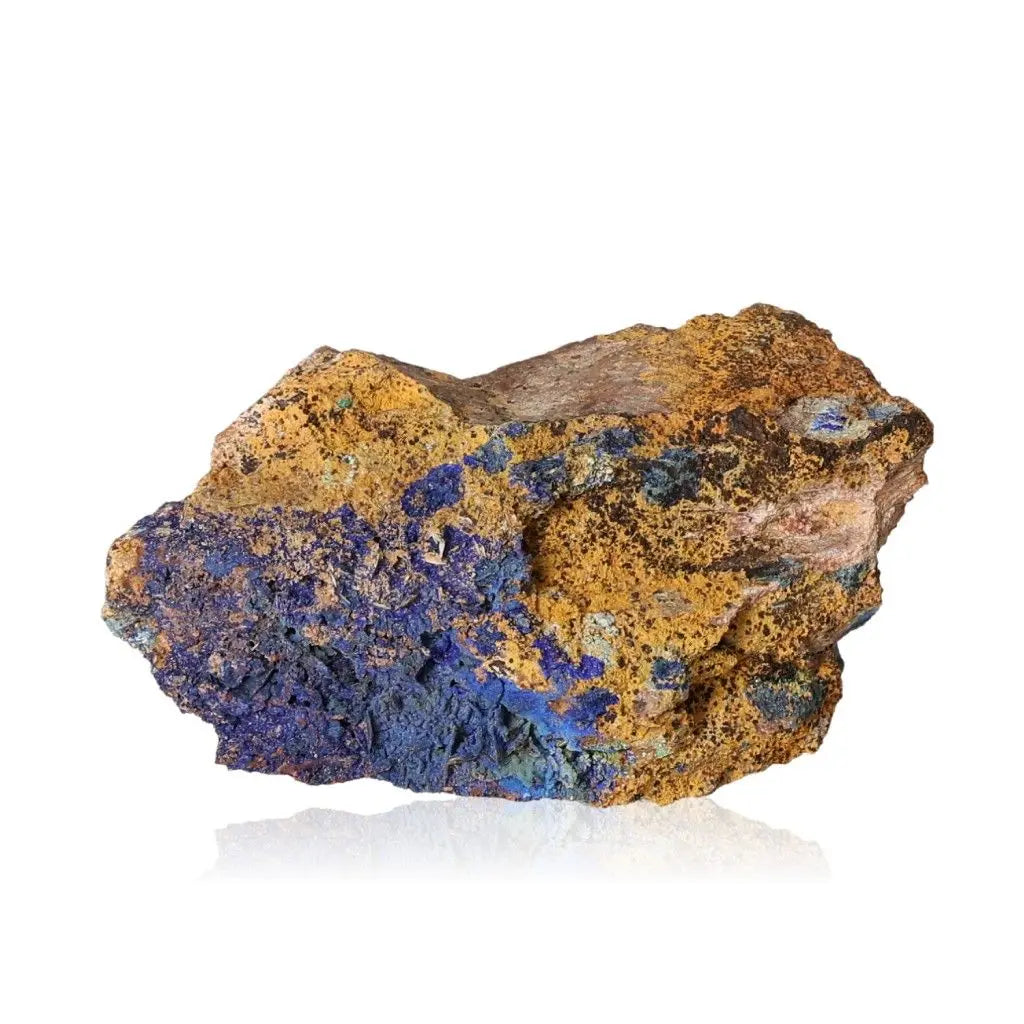 Azurite druze stone with deep blue hues and earthy textures, known for enhancing intuition and spiritual insight.