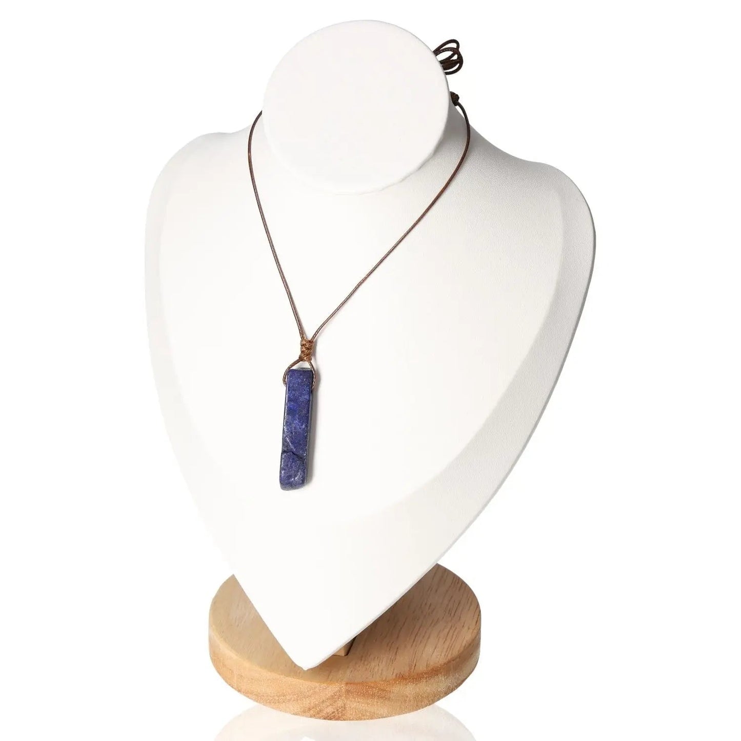 Boho Necklace Lapis Lazuli on display stand, showcasing elegant design and deep blue stone for spiritual growth and truth.