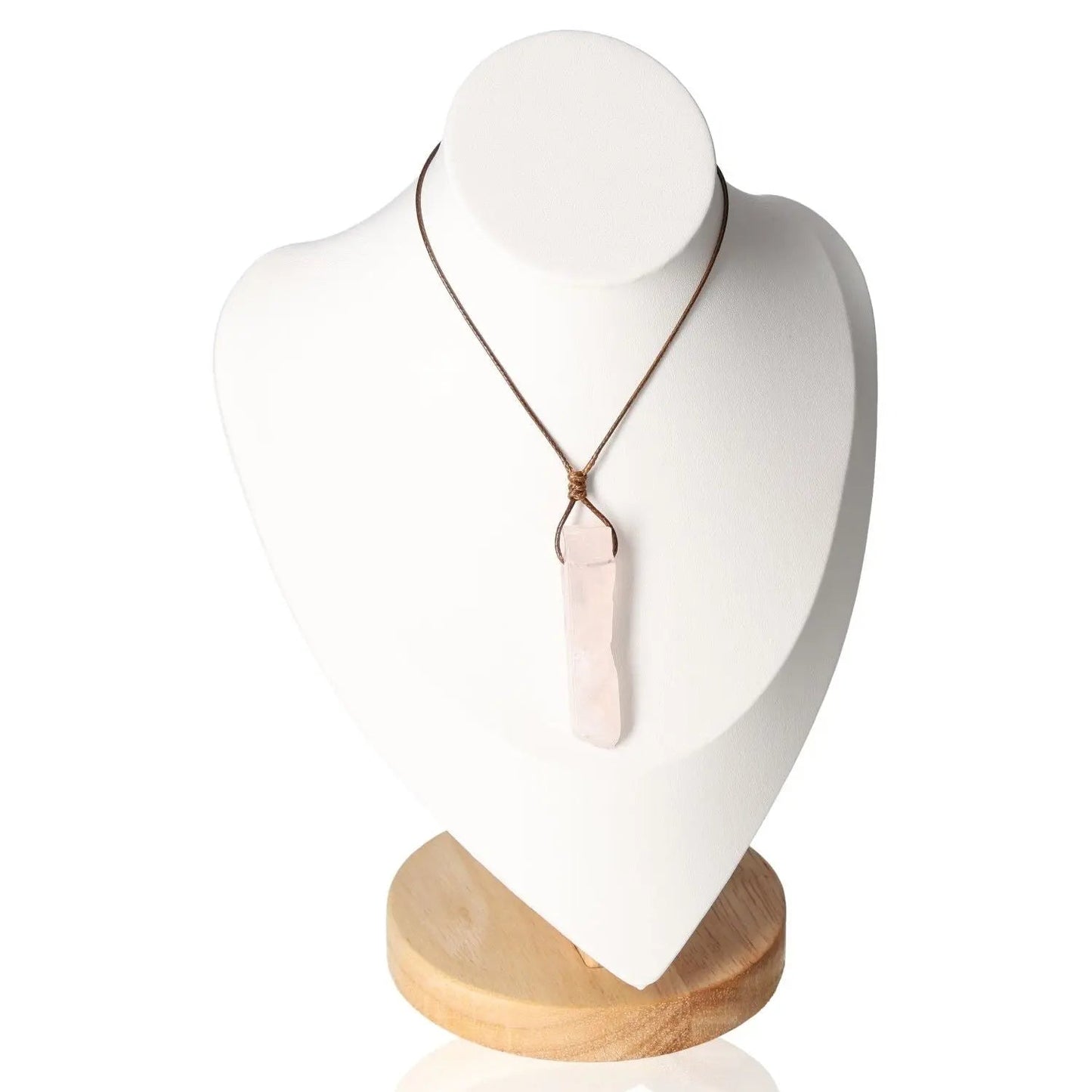 Boho Necklace with Rose Quartz pendant on display stand, promoting serenity and unconditional love.