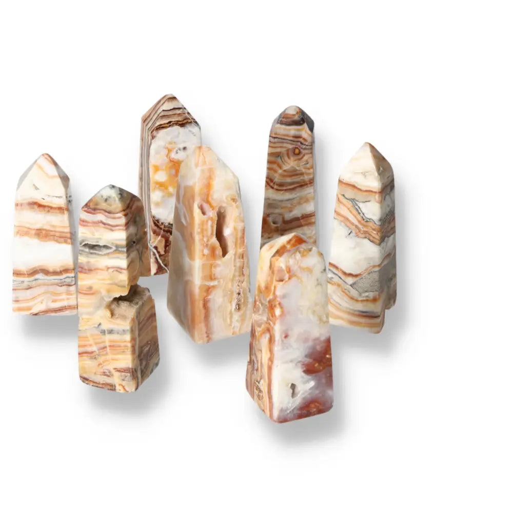 Brown Aragonite Tower collection showcasing natural earthy tones and stabilizing properties, ideal for enhancing spaces with grounding energy.