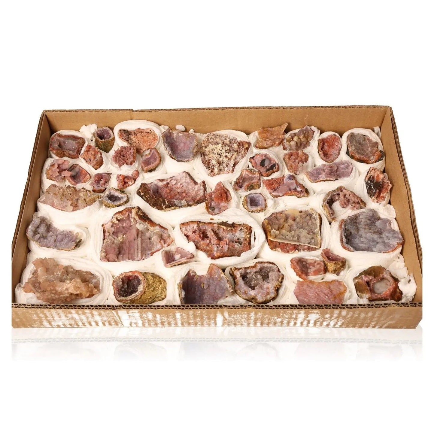 Box of medium calcite stalactite druzes with crystal formations, ideal for workspace energy clearing and personal growth support.