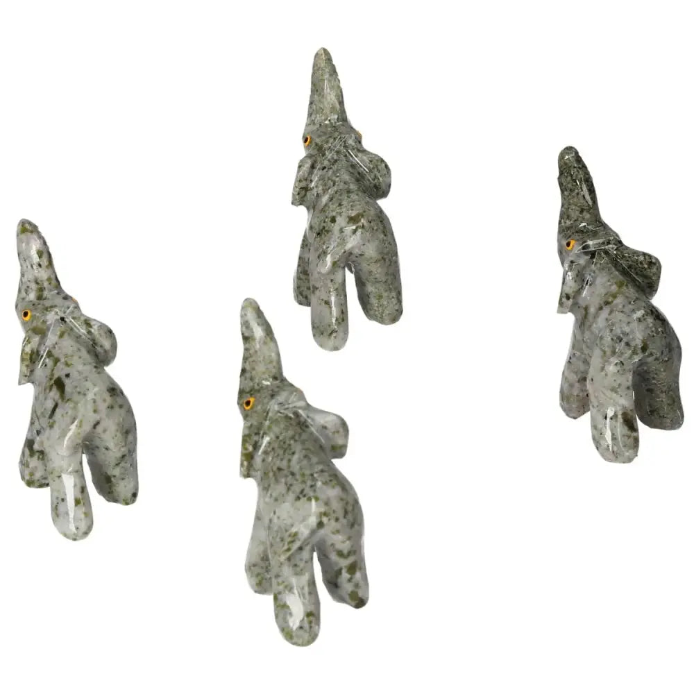 Carved Crystal Elephants in green dolomite showcasing intricate artistry and grounding energy from Sylvia Crystals.