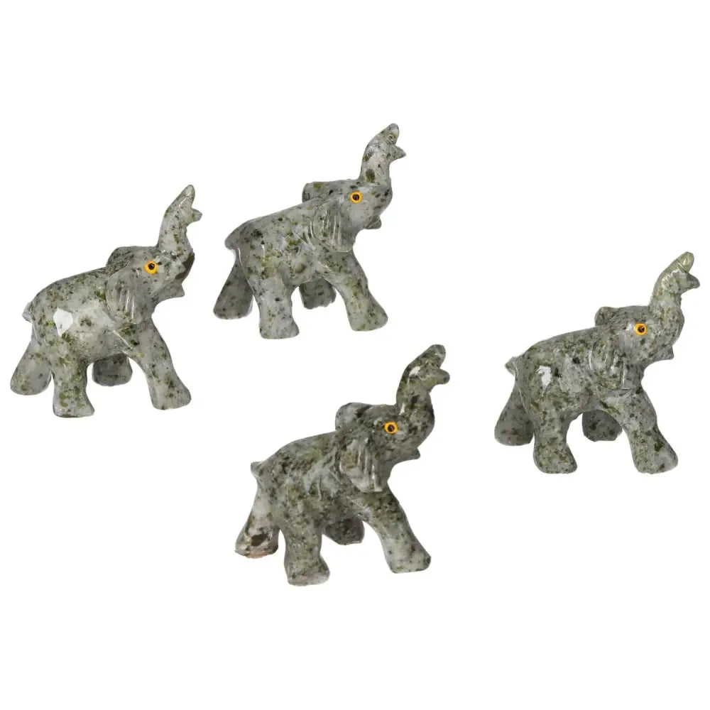 Intricately carved crystal elephants made from premium dolomite, showcasing elegant design and grounding energy from Sylvia Crystals.