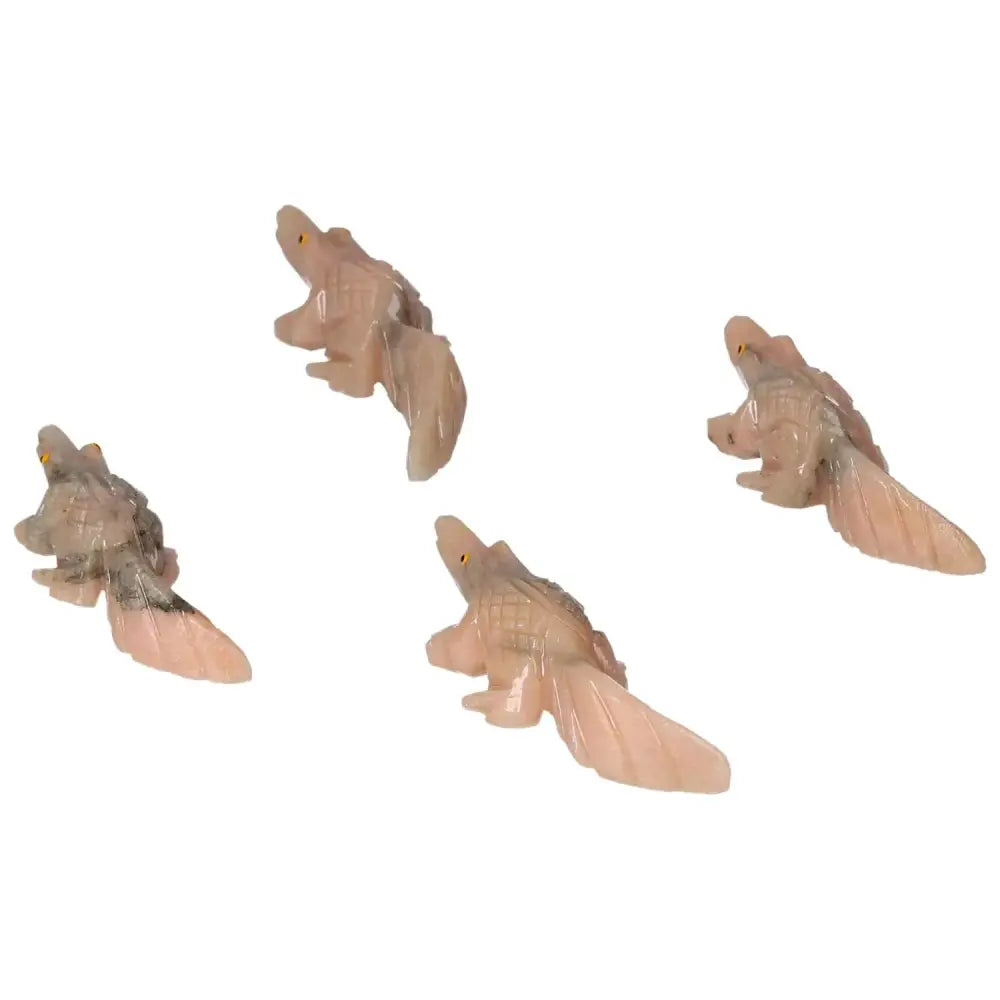 Carved Dolomite Alligator figurines showcasing intricate details, known for calming and grounding properties.
