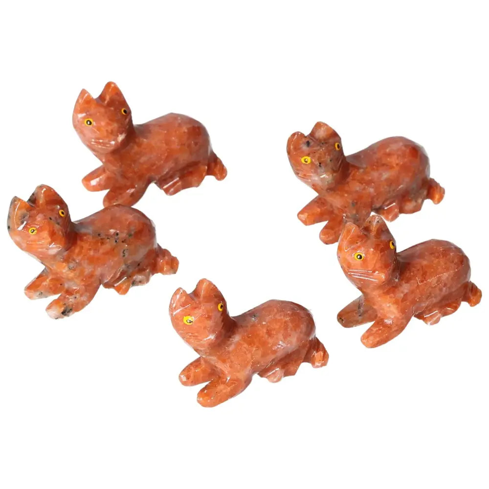 Hand-carved Dolomite Cat figurines showcasing exquisite craftsmanship, promoting tranquility and balance. Ideal decorative pieces.