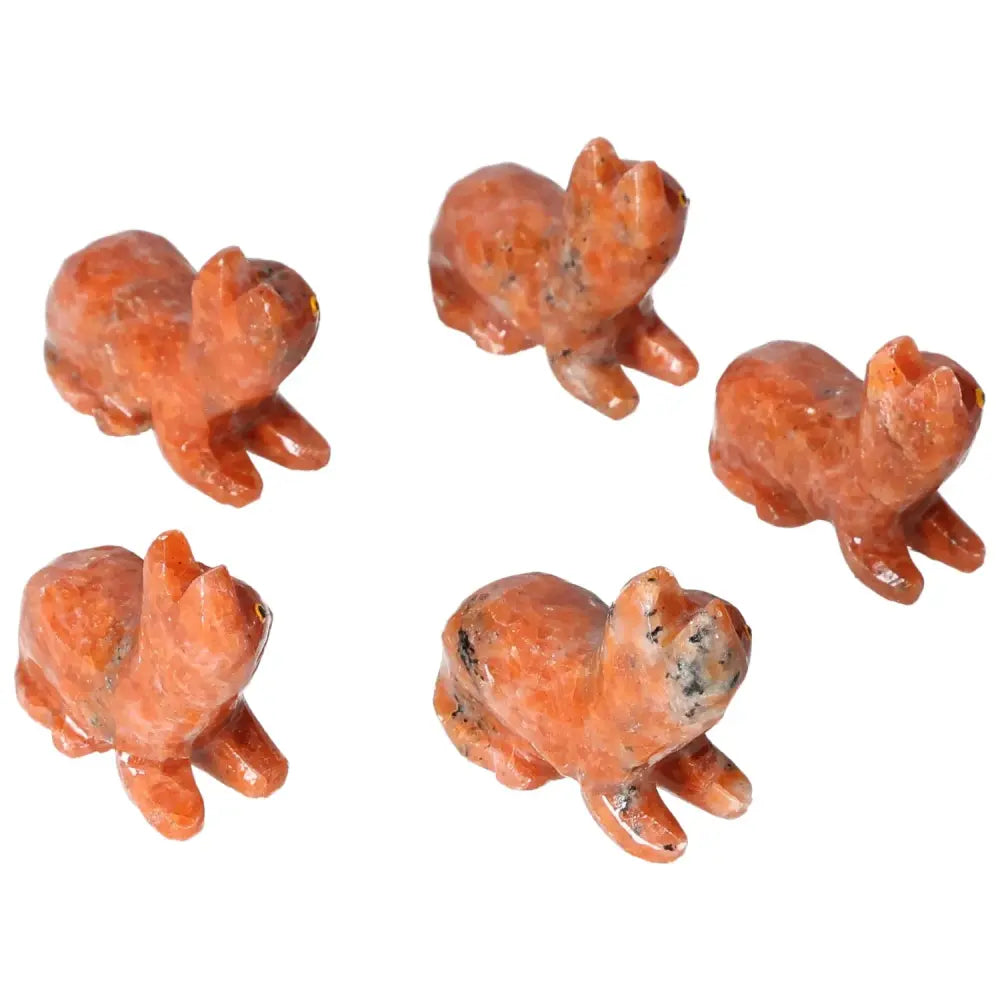 Carved Dolomite Cat figurines showcasing intricate craftsmanship for peace and balance; premium decor from Sylvia Crystals.