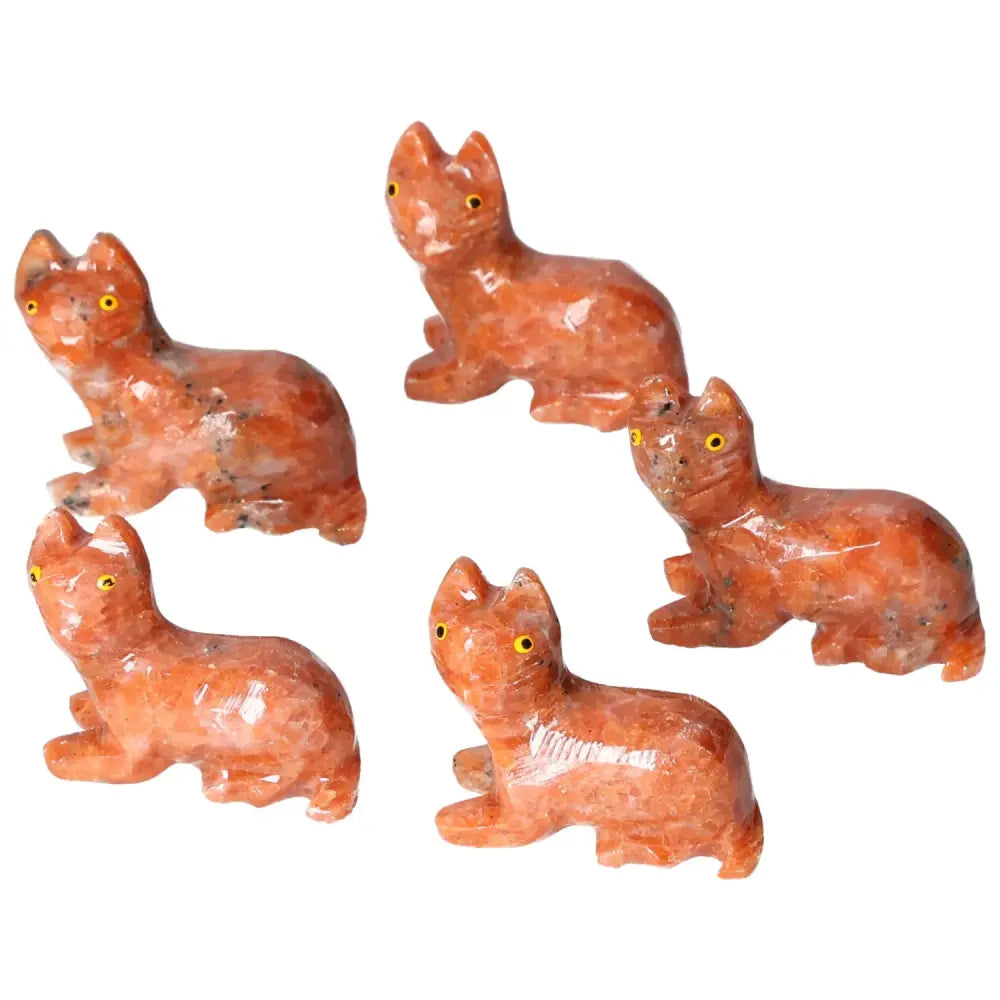 Carved Dolomite Cat figurines from Sylvia Crystals, showcasing exquisite artistry and natural tranquility-enhancing properties.