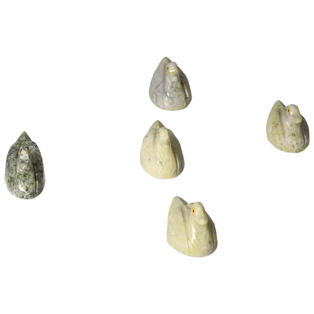 Carved Dolomite Duck figurines enhancing serenity and elegance with calming, emotional balance properties by Sylvia Crystals.