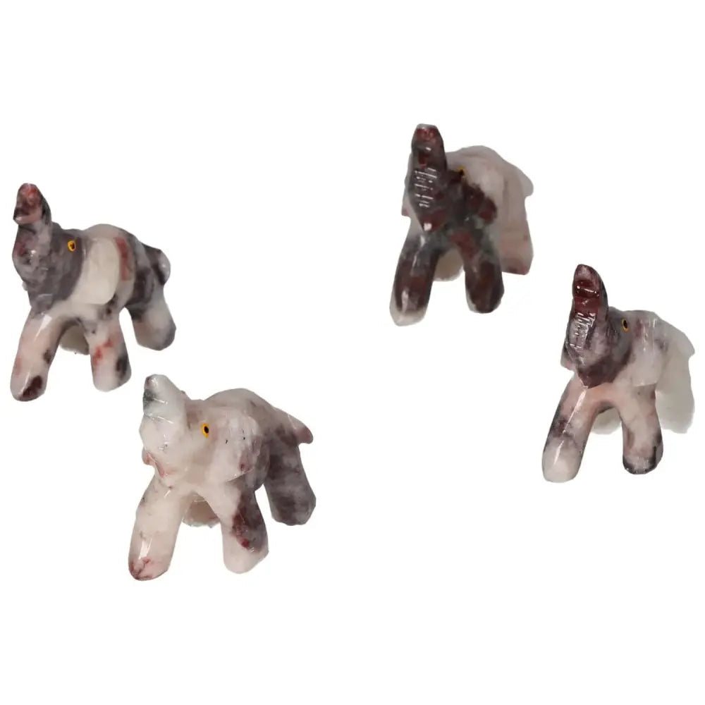 Carved Dolomite Elephant from Sylvia Crystals showcasing exquisite craftsmanship and tranquil natural beauty for home or office decor.