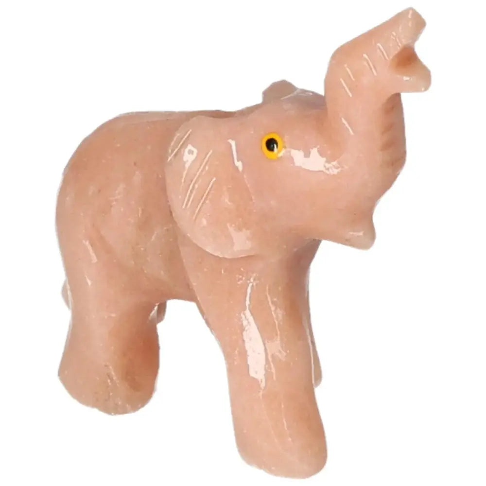Carved Dolomite Elephant sculpture from Sylvia Crystals, symbolizing strength and wisdom, elegantly crafted for aesthetic beauty and healing.