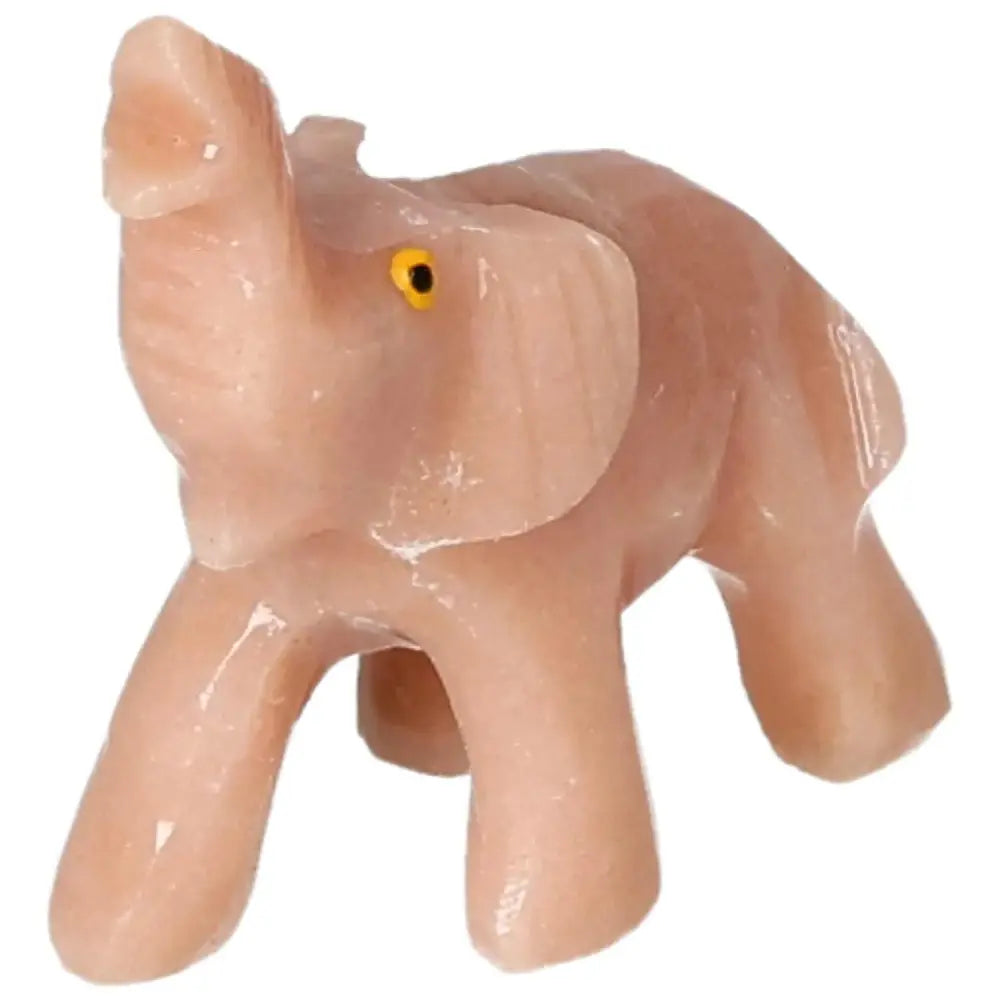 Carved dolomite elephant sculpture from Sylvia Crystals, symbolizing strength and wisdom, crafted for emotional healing and elegance.