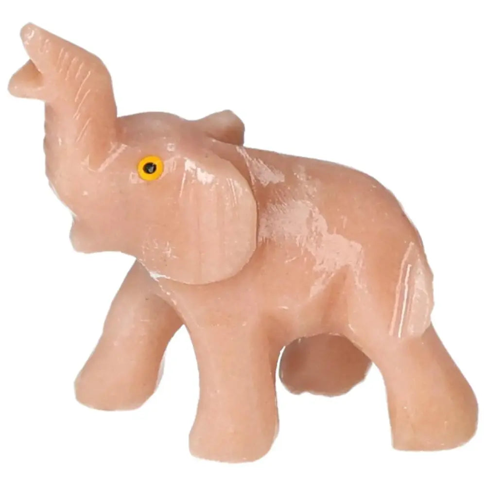 Hand-carved dolomite elephant sculpture from Sylvia Crystals, symbolizing strength and wisdom, with grounding and healing properties.