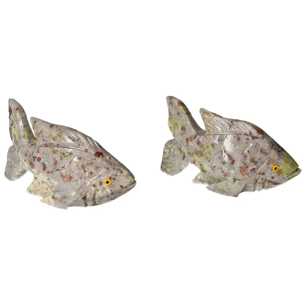 Pair of carved dolomite fish crystals promoting emotional balance and tranquility, available at Sylvia Crystals.