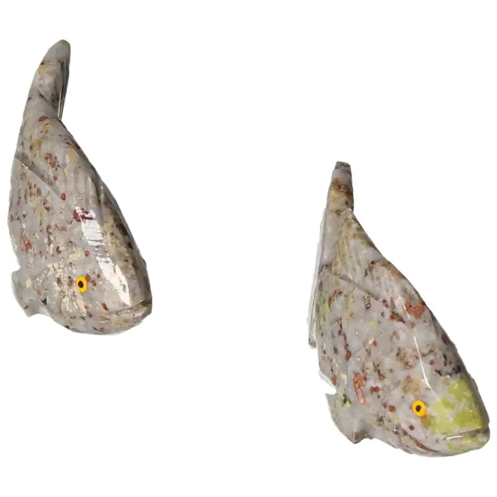 Carved Dolomite Fish sculptures from Sylvia Crystals, promoting tranquility and emotional balance, perfect for interior decor.