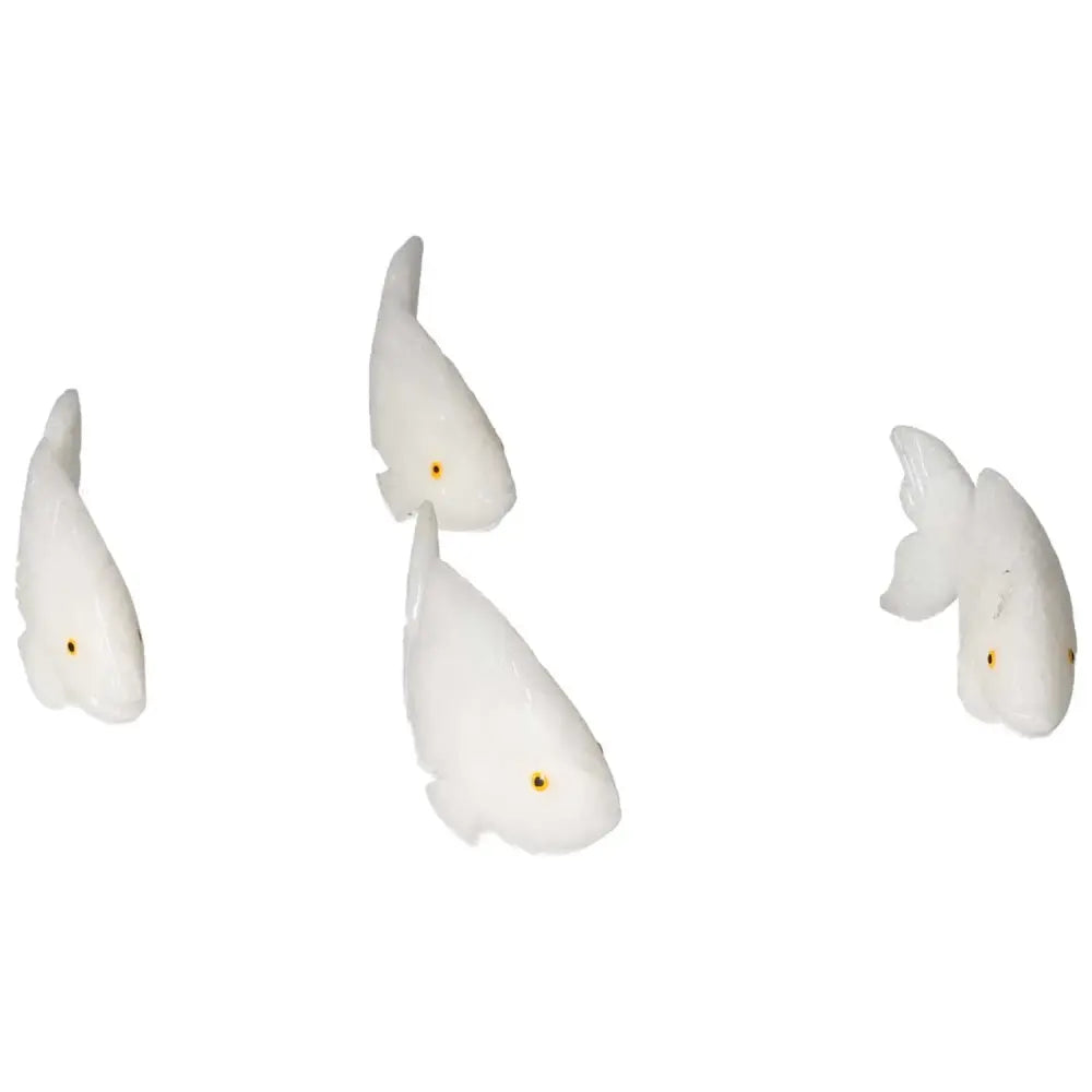 Carved Dolomite Fish by Sylvia Crystals showcasing exquisite handpicked artistry for emotional balance and grounding.