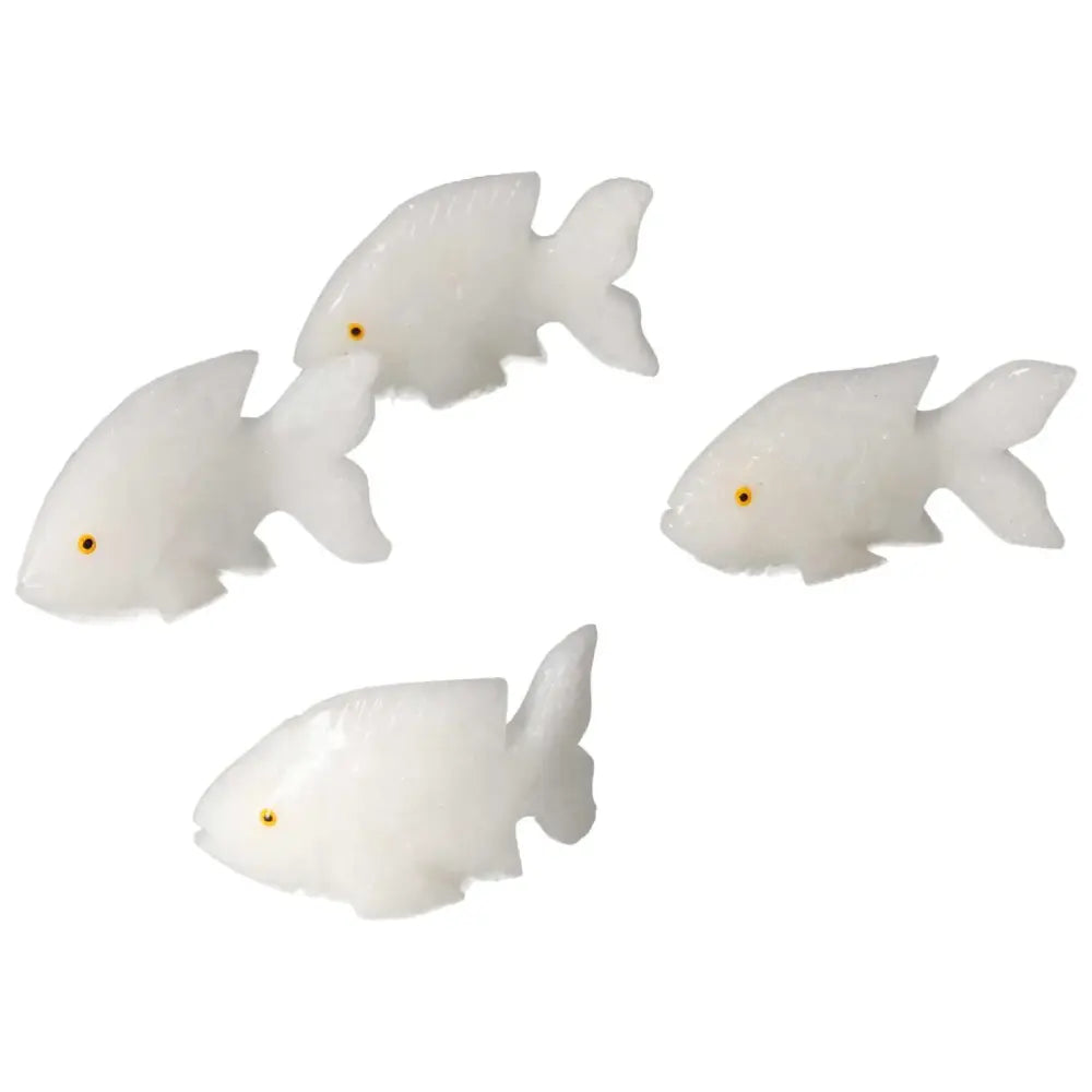 Hand-carved Dolomite Fish figurines from Sylvia Crystals, designed for emotional balance and luxury aesthetics, in a white finish.