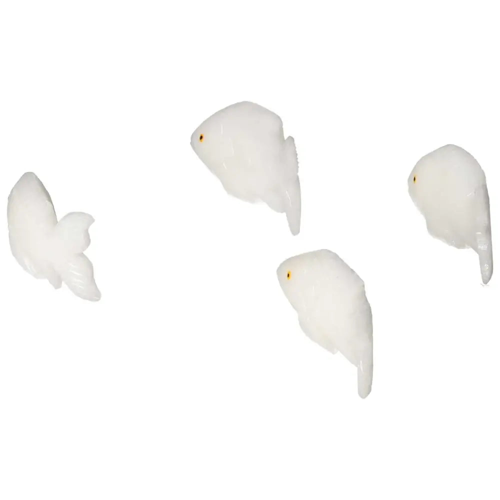 Carved dolomite fish from Sylvia Crystals, showcasing luxurious artistry and promoting emotional balance and well-being.