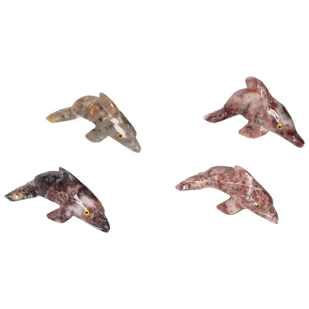 Elegant carved magnesite dolphin figurines from Sylvia Crystals, perfect for enhancing meditation spaces and promoting peace.