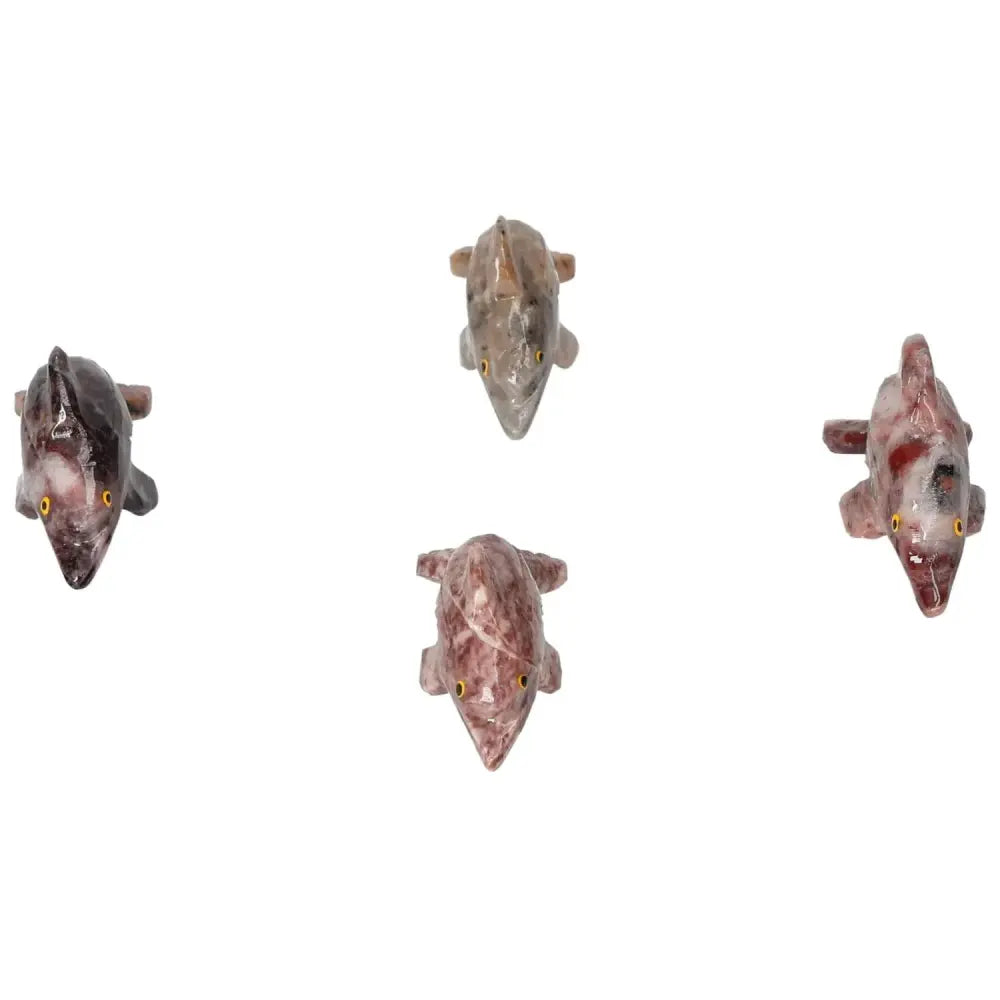 Carved Magnesite Dolphin crystals in various colors, perfect for enhancing meditation and home decor, from Sylvia Crystals.
