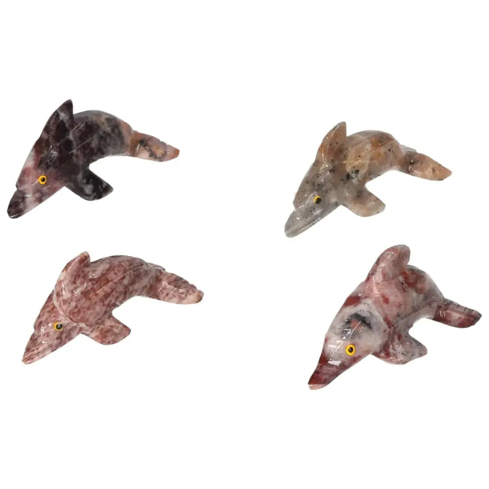 Handcarved magnesite dolphin figures by Sylvia Crystals, promote peace and enhance meditation spaces with spiritual elegance.