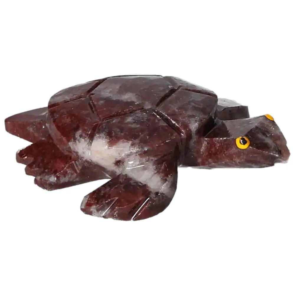 Handcrafted red-brown carved magnesite turtle figurine from Sylvia Crystals, showcasing natural elegance and spiritual properties.