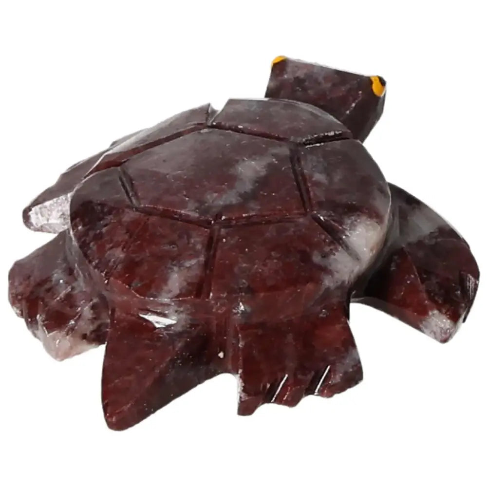 Carved Magnesite Turtle from Sylvia Crystals, showcasing its exquisite design and spiritual properties for tranquility and growth.