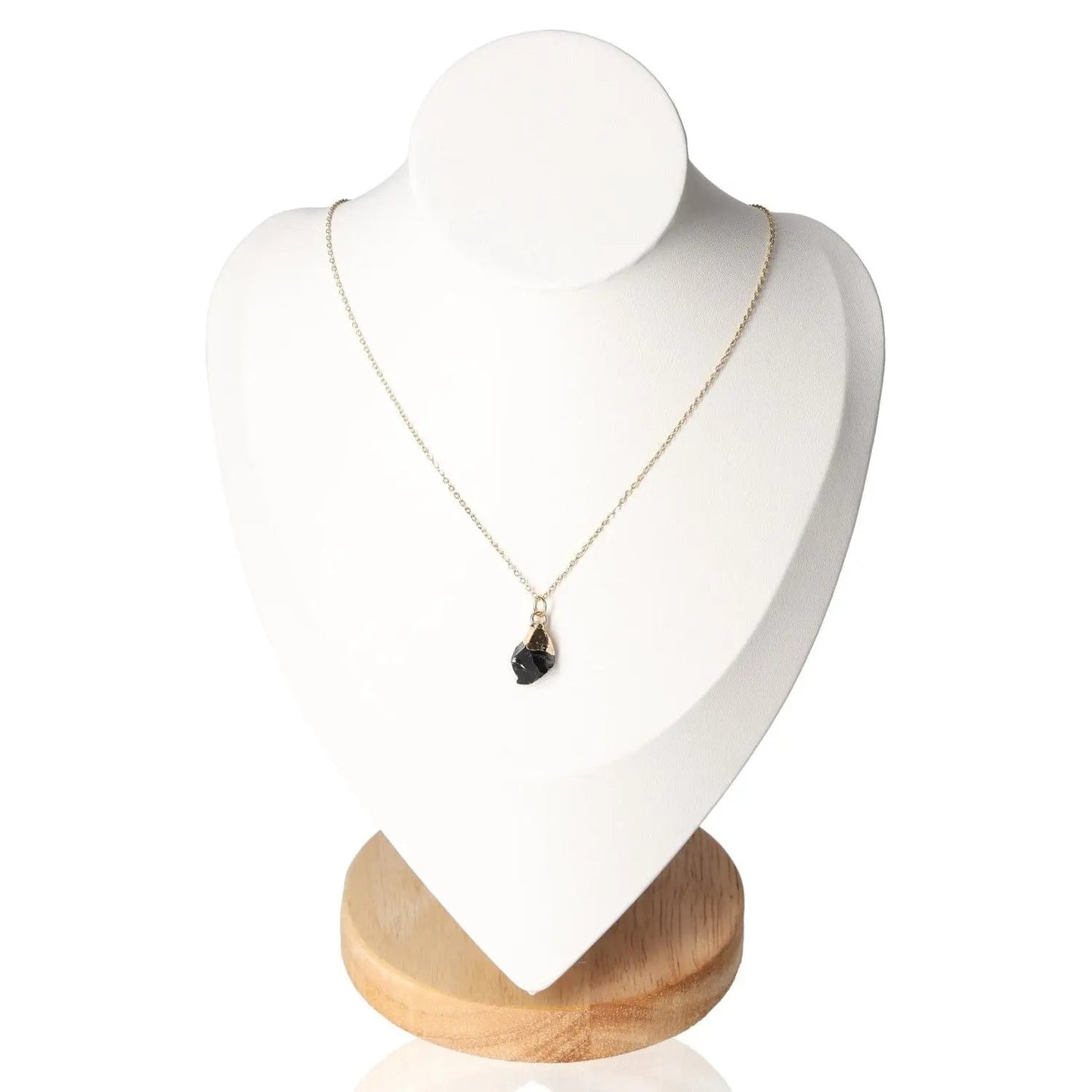 Empath crystal necklace set displayed on a mannequin, featuring a Black Onyx pendant for enhancing intuition and protection.