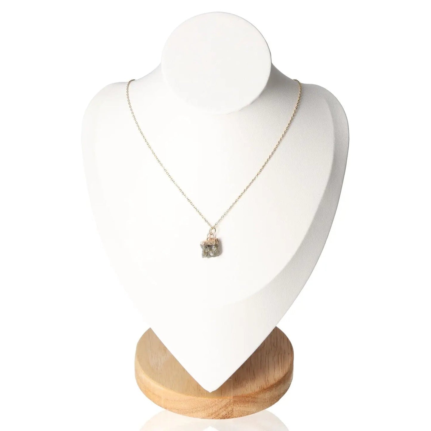 Elegant crystal necklace on display stand, part of the "Protection" set, offering tranquility and defense against negativity.
