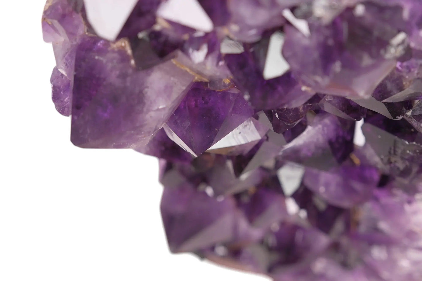 Close-up of stunning Amethyst Druze crystal with rich purple hues, promoting relaxation and emotional balance.