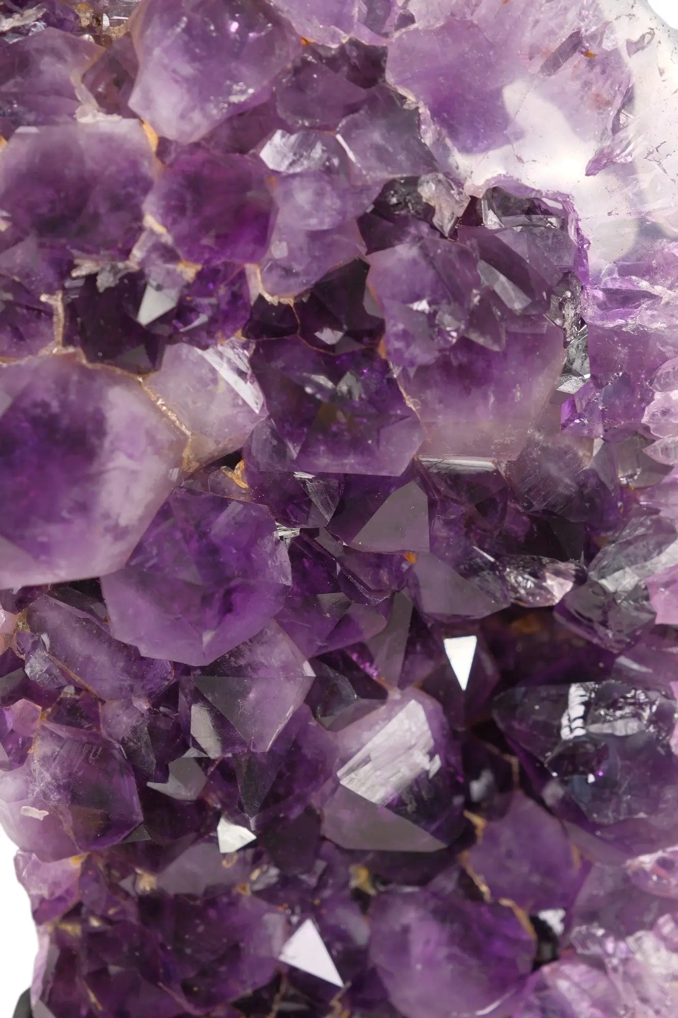 Close-up of radiant purple Amethyst Druze crystal, showcasing its natural beauty and stress-relieving properties.