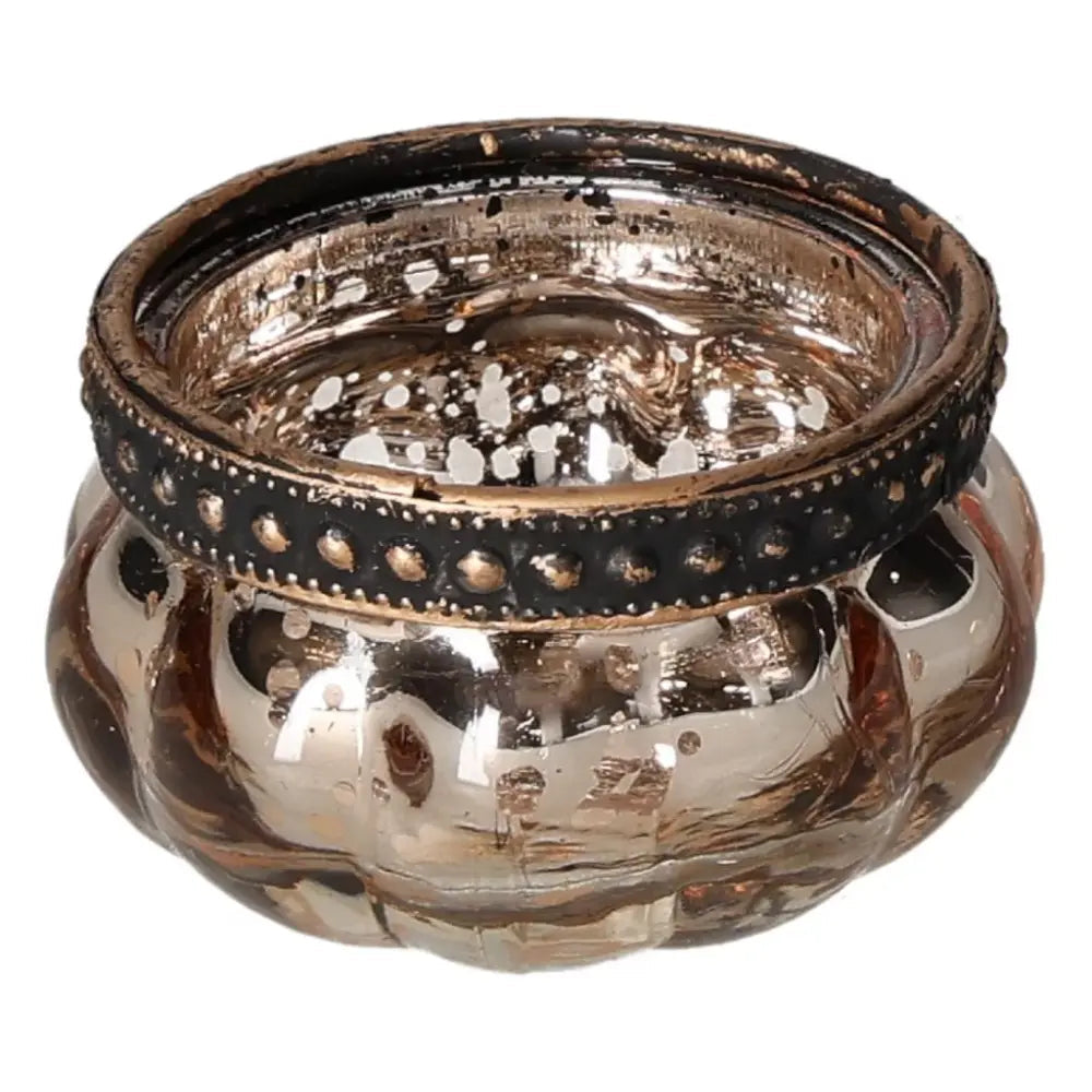 Elegant gold candle holder with a decorative black rim, reflecting luxurious craftsmanship and spiritual harmony.