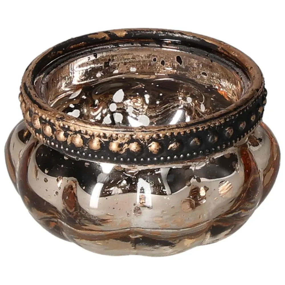 Luxurious gold candle holder with intricate crystal detailing, symbolizing sophistication and peace. Perfect for home decor and spiritual harmony.