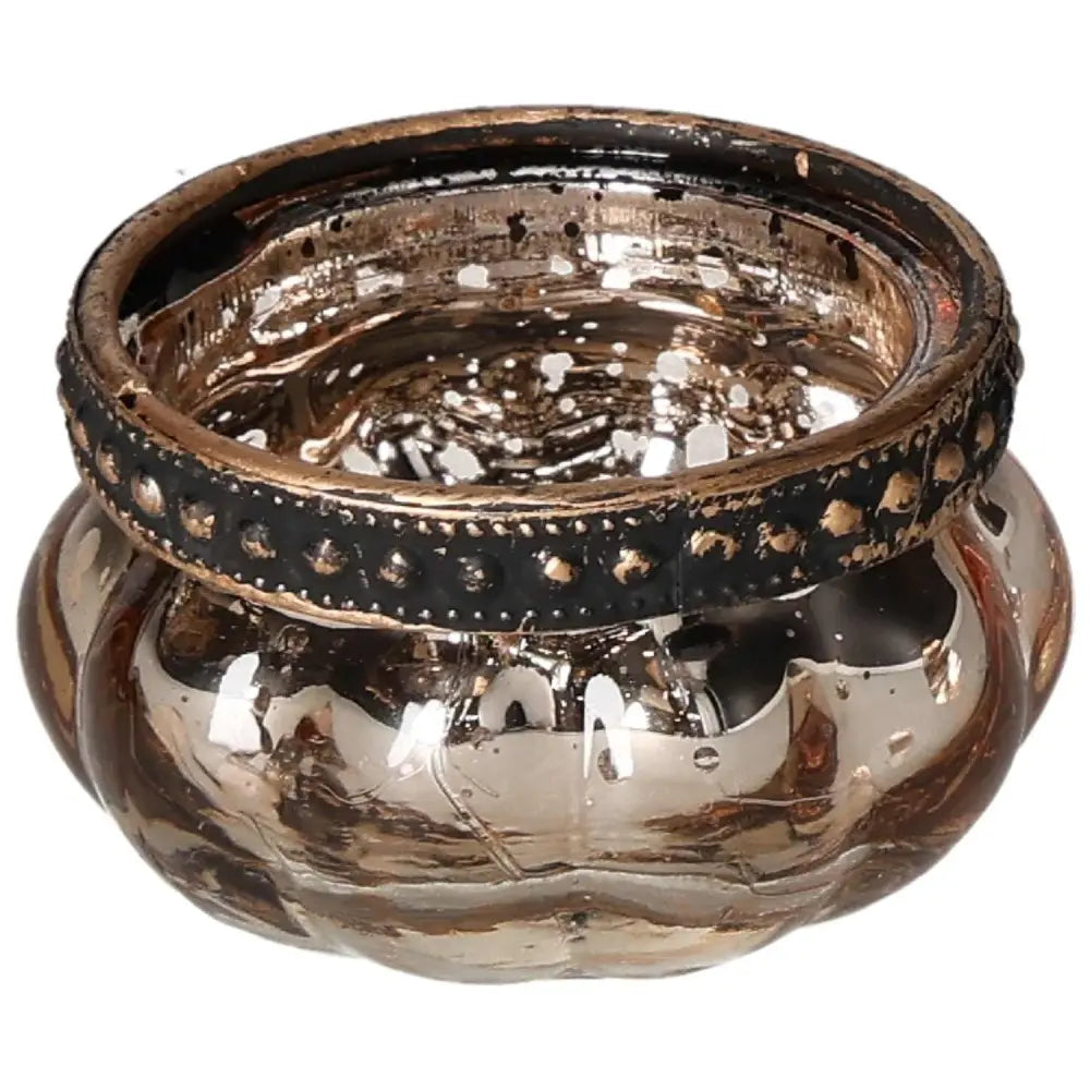 Luxurious gold candle holder with intricate designs symbolizing sophistication and serenity, enhanced with crystal elements.