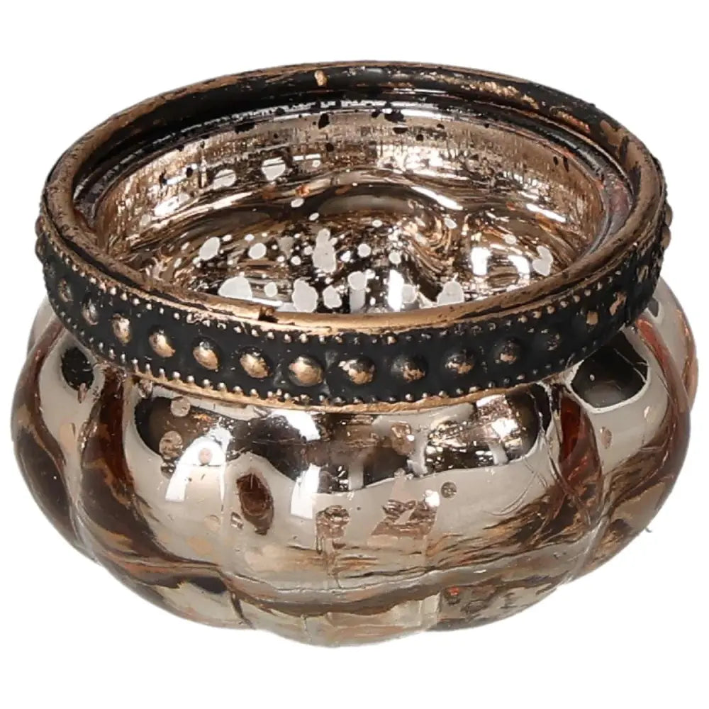 Elegant Sylvia Crystals gold candle holder with intricate design, embodying luxury and serenity in a sophisticated accessory.