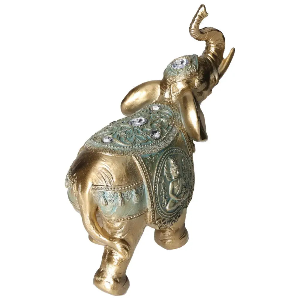 Elegant polyresin gold elephant figurine with intricate designs, symbolizing luxury and harmony, from Sylvia Crystals.