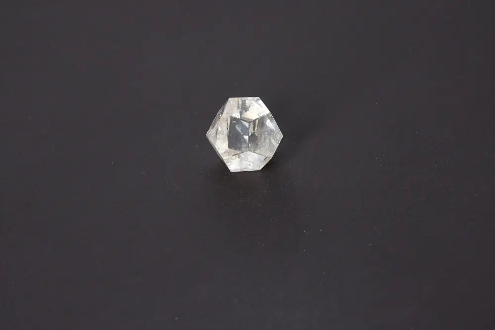 Lemurian Quartz Geometric Sphere 3.5cm displaying sacred geometry on a dark background, symbolizing spiritual awakening and intuition.