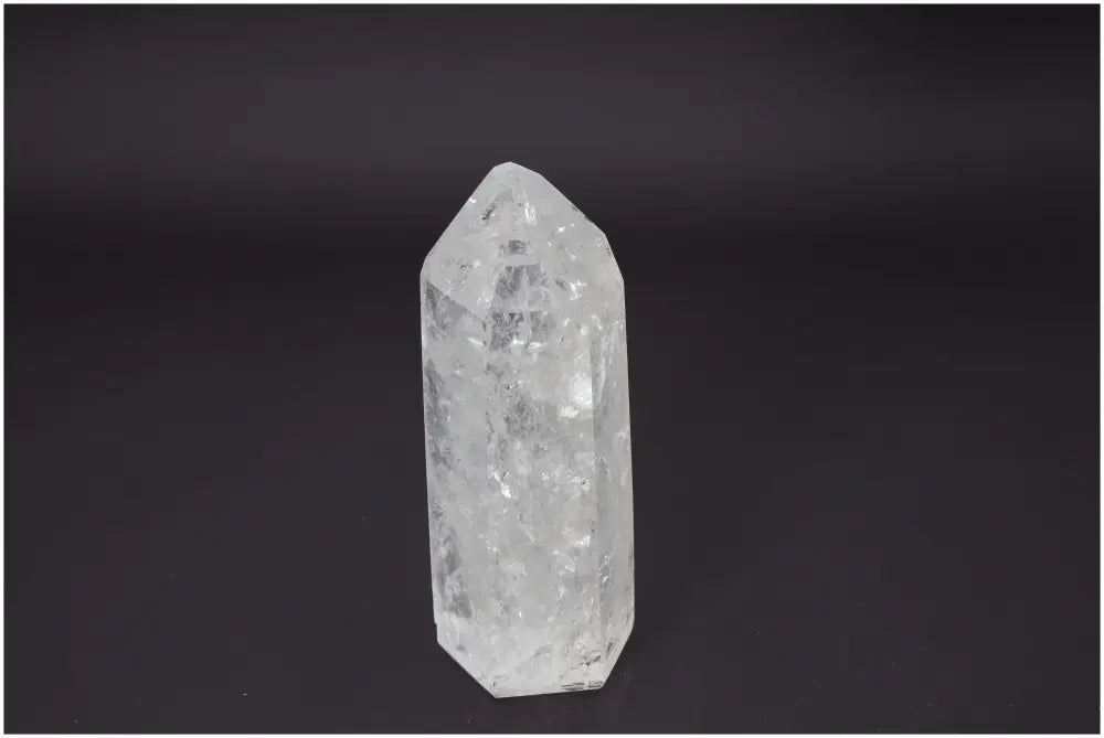 Clear Lemurian Quartz Obelisk - Enhances spiritual energy, chakra alignment, and zodiac connection with unique quartz properties.