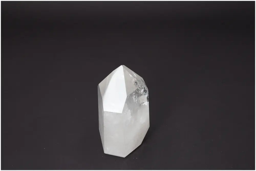 Lemurian Quartz Obelisk with spiritual properties, supports chakras and zodiac signs for energetic balance.